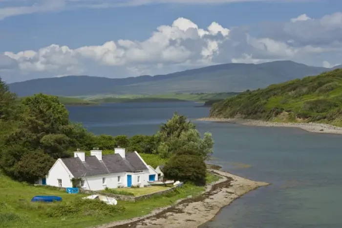 Framed Print : Ireland, Claggan. A cottage sits on the bay Framed Print : Ireland, Claggan. A cottage sits on the bay