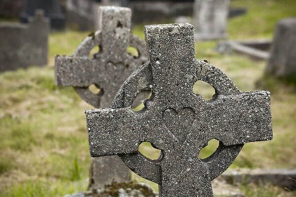 Ireland, County Mayo, Achill Island. Celtic gravestone crosses with heart carving