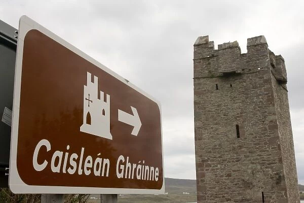 Ireland, County Mayo, Achill Island. Gaelic sign to Kildownet Castle, owned by the