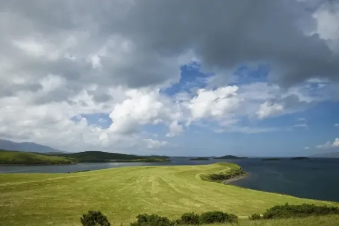 Framed Print : Ireland, County Mayo. A grazing pasture reaches down to the waters of Clew Bay
