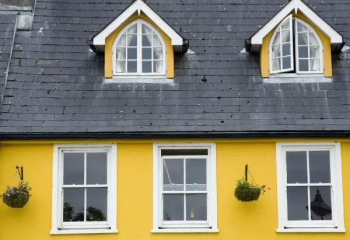 Framed Print : Ireland, County Mayo, Westport. Cheerful yellow house Framed Print : Ireland, County Mayo, Westport. Cheerful yellow house