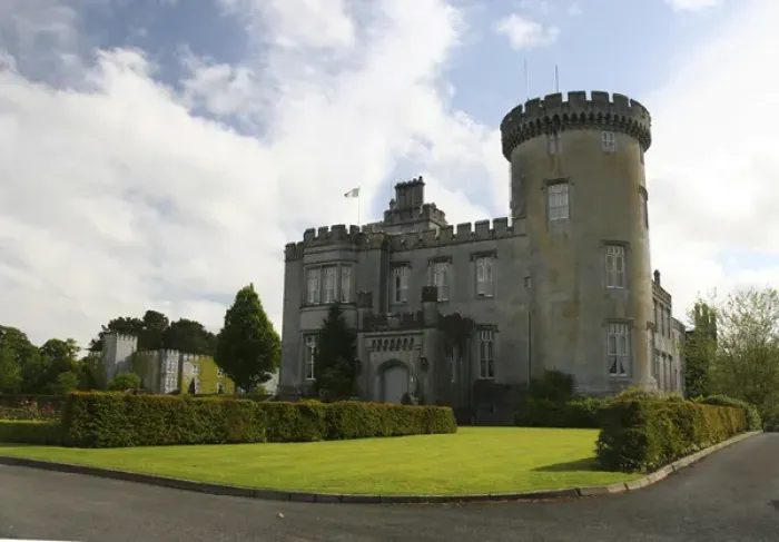 Framed Print : In Ireland, the Dromoland Castle side entrance and turret blue sky white clouds Framed Print : In Ireland, the Dromoland Castle side entrance and turret blue sky white clouds