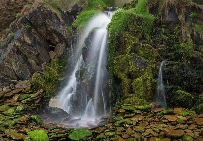 Framed Print : Ireland, Ferriter's Cove. Close-up of waterfall and mossy rocks