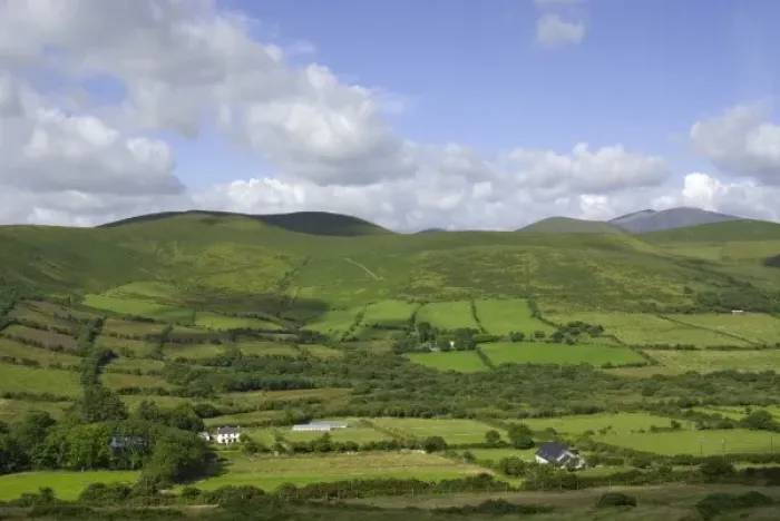 Framed Print : Ireland, Kerry. Dingle Peninsula. Green farmland covering the hills