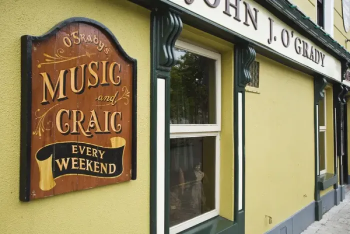 Framed Print : Irieland, Westport. Sign advertises fun and music at a traditional pub Framed Print : Irieland, Westport. Sign advertises fun and music at a traditional pub