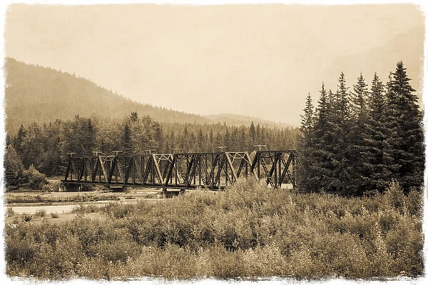 An iron rail crossing bridge in vintage sepia, Alaska