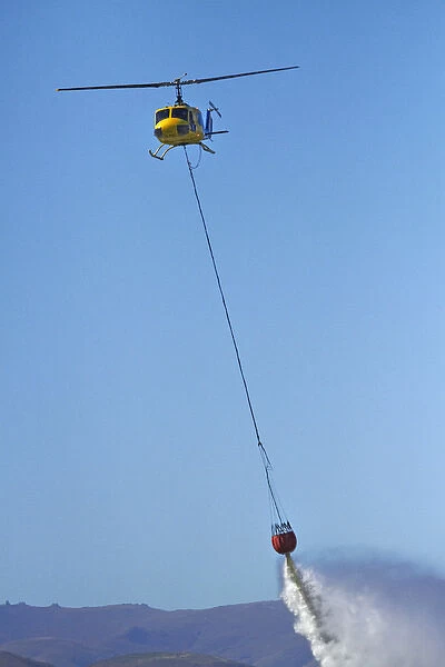 Iroquois Helicopter with monsoon bucket, Warbirds over Wanaka Airshow, Wanaka, South Island