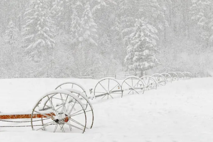 Framed Print : Irrigation sprinkler system in winter snowstorm, Kalispell, Montana Framed Print : Irrigation sprinkler system in winter snowstorm, Kalispell, Montana