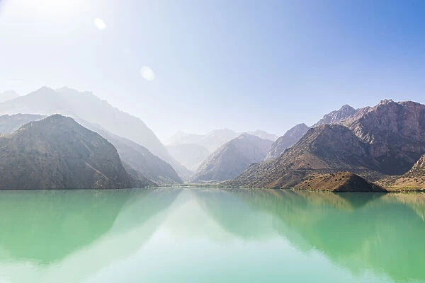 Iskanderkul, Sughd Province, Tajikistan. Misty mountains above Iskanderkul Lake