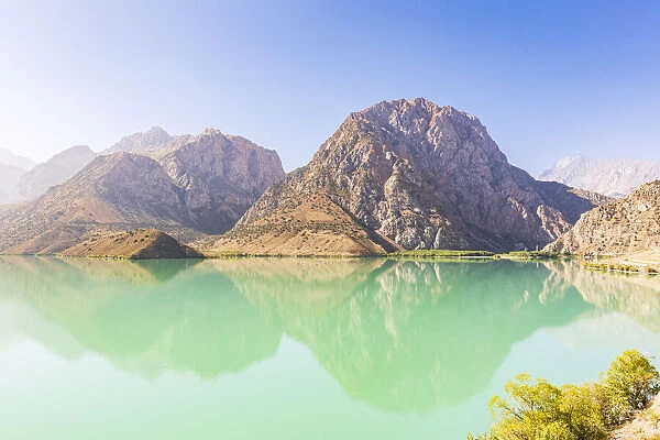 Iskanderkul, Sughd Province, Tajikistan. Mountains and blue sky above Iskanderkul Lake