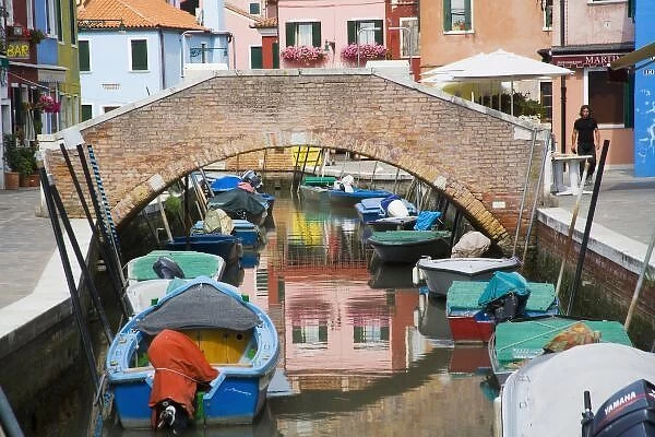 Island of Burano, Burano, Italy. Colorful Burano City homes Reflecting in the Canal