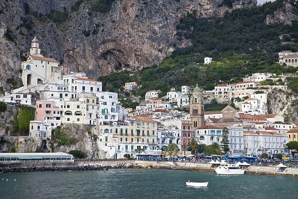 Italy, Amalfi. The coastal town of Amalfi as seen from a boat in the harbor