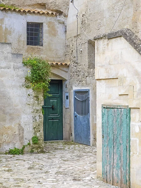 Italy, Basilicata, Matera. Doors in a courtyard in the old town of Matera
