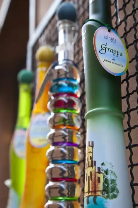 Framed Print : ITALY, Brescia Province, Sirmione. Ornate bottles of grappa Framed Print : ITALY, Brescia Province, Sirmione. Ornate bottles of grappa