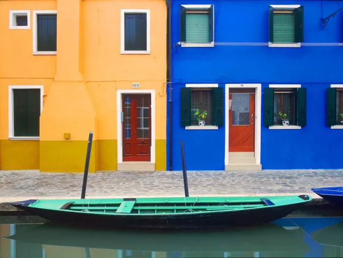 Framed Print : Italy, Burano. Colorful house exteriors and boat in canal Framed Print : Italy, Burano. Colorful house exteriors and boat in canal