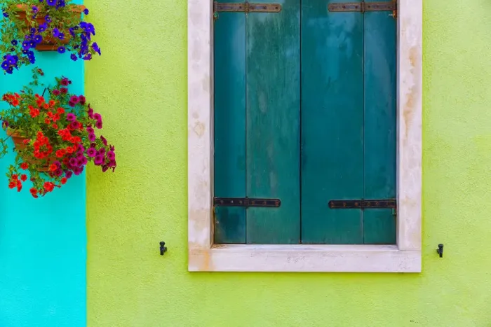 Framed Print : Italy, Burano. Colorful house wall and window