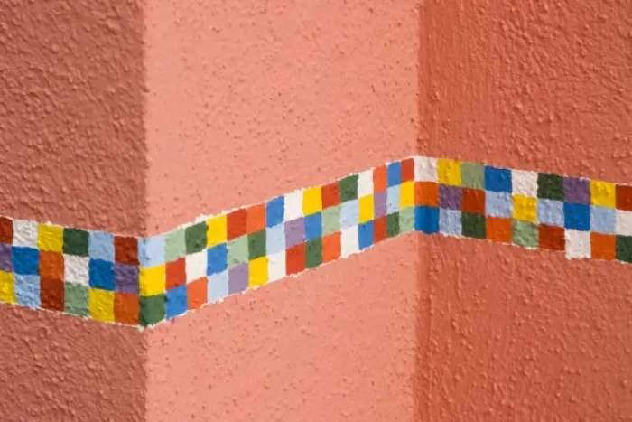Framed Print : Italy, Burano. Decorative checkerboard border painted on a house Framed Print : Italy, Burano. Decorative checkerboard border painted on a house