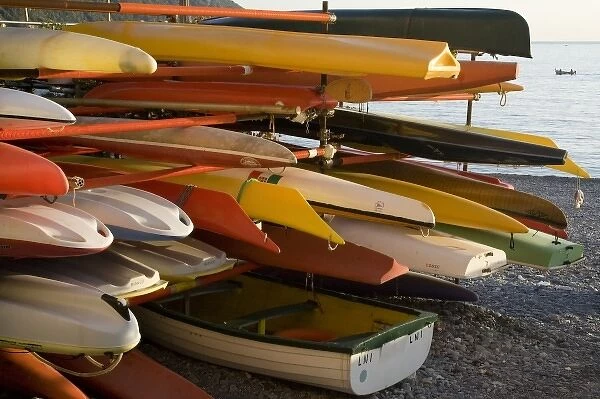 Italy, Camogli. Stacked kayaks for rent