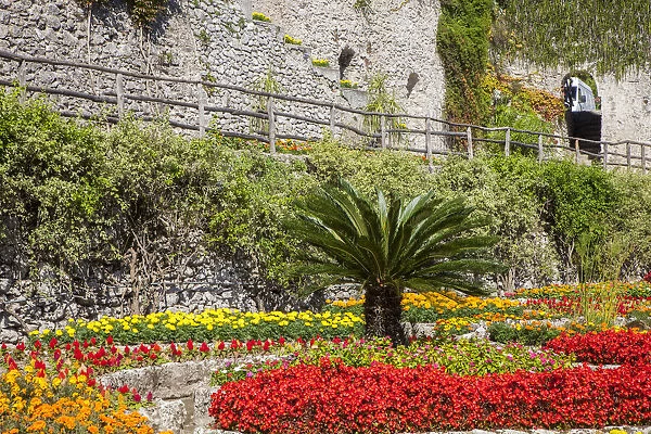 Italy, Campania, Ravello. Flower garden of Villa Rufolo over looking the Amalfi Coast and the Gulf of Salerno