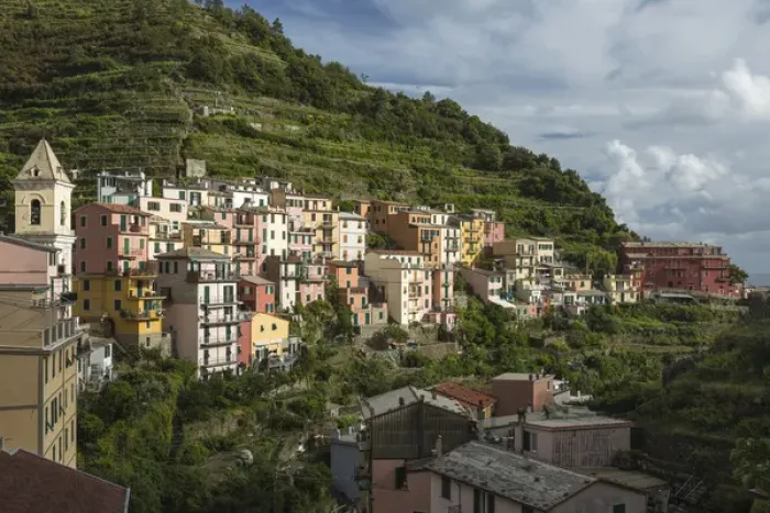 Framed Print : Italy, Cinque Terre, Manarola. View of Manarolas houses amidst the steep hillsides