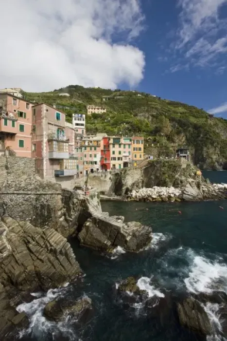 Framed Print : Italy, Cinque Terre, Riomaggiore. The village sits on cliffs above the sea Framed Print : Italy, Cinque Terre, Riomaggiore. The village sits on cliffs above the sea