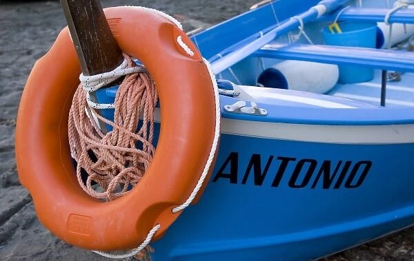 Italy, Cinque Terre, Vernazza. Blue boat bow with orange life preserver
