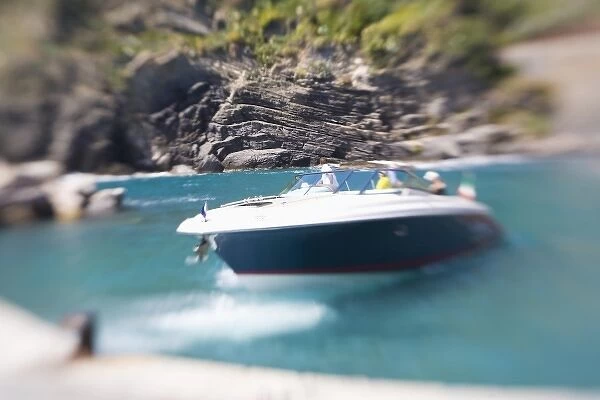 Italy, Cinque Terre, Vernazza, Selective Focus of Speed Boat in Harbor of Vernazza