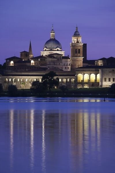 Italy, Mantua Province, Mantua. Town view and Palazzo Ducale from Lago Inferiore, dusk