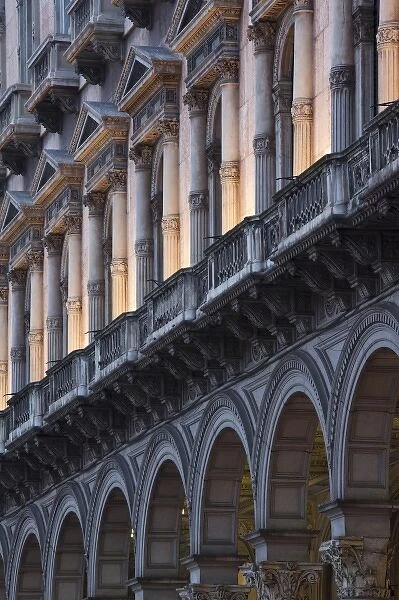 Italy, Milan Province, Milan. Piazza del Duomo, arches, morning