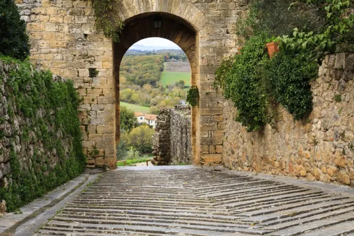 Framed Print : Italy, Monteriggioni. Arched exit-way through city walls Framed Print : Italy, Monteriggioni. Arched exit-way through city walls