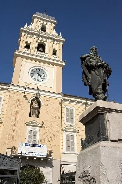 Italy, Parma. The main government building painted yellow with a statue of Garibaldi