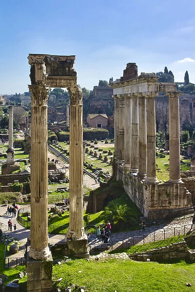 Italy, Rome, temple and arch ruins at Roman Forum