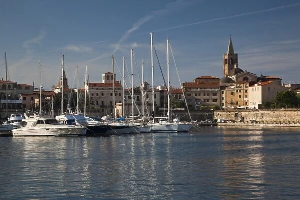 ITALY, Sardinia, Alghero. City walls from the yacht marina, morning