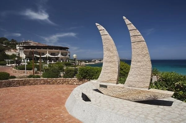 Italy, Sardinia, Baja Sardinia. Sailboat statue, beachside resort
