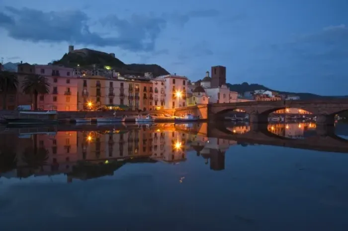 Framed Print : Italy, Sardinia, Bosa. Evening along Temo Riverfront and Ponte Vecchio bridge