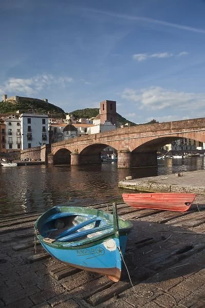 Italy, Sardinia, Bosa. Town view along Temo River and Ponte Vecchio bridge