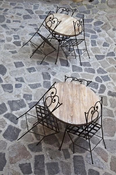 Italy, Sardinia, Castelsardo. Cafe tables