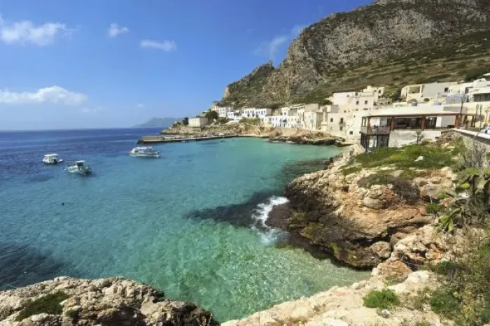 Framed Print : Italy, Sicily, Egadi Islands, Levanzo, transparent blue sea in front of little village Framed Print : Italy, Sicily, Egadi Islands, Levanzo, transparent blue sea in front of little village
