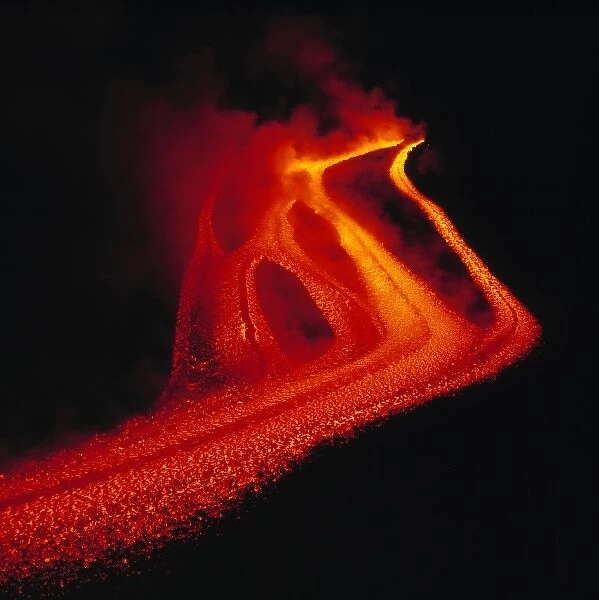 Italy, Sicily, Mt Etna lava. The dark of night intensifies the dramatic color of