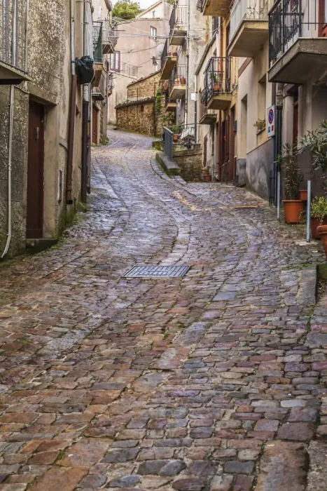 Framed Print : Italy, Sicily, Palermo Province, Geraci Siculo. Winding narrow cobblestone street in Framed Print : Italy, Sicily, Palermo Province, Geraci Siculo. Winding narrow cobblestone street in