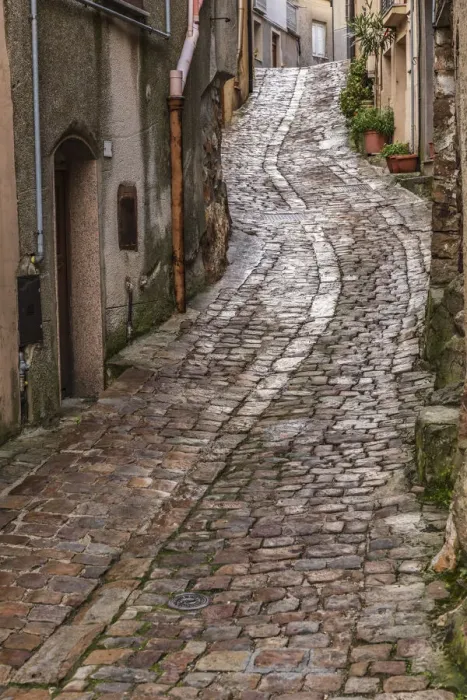 Framed Print : Italy, Sicily, Palermo Province, Geraci Siculo. Winding narrow cobblestone street in Framed Print : Italy, Sicily, Palermo Province, Geraci Siculo. Winding narrow cobblestone street in