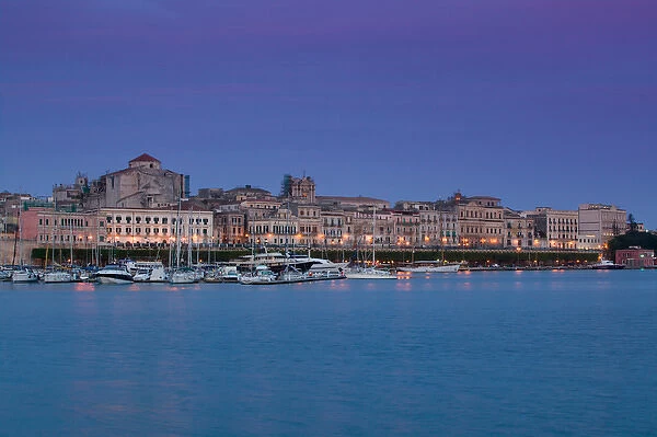 ITALY-Sicily-SIRACUSA (Syracuse): Evening View of Ortygia Island from Commercial Port