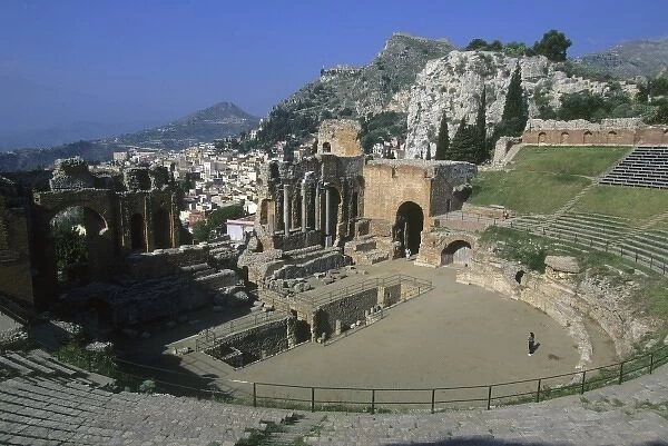 Italy, Sicily, Taormina, Greek theatre with town in background