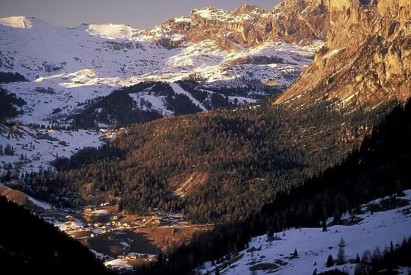Italy, Trentino, Alto Adige, Passo di Sella. Sunset view of Selva di Val Gardena