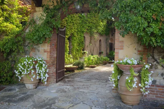 Framed Print : Italy, Tuscany. Courtyard of an agriturismo near the hill town of Montalcino