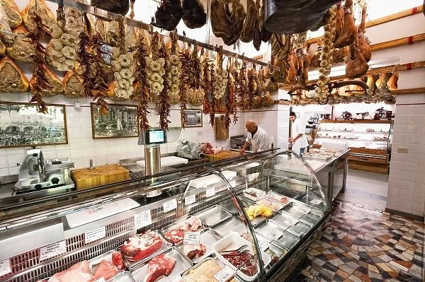Italy, Tuscany, Greve. Salumi market in Greves main square