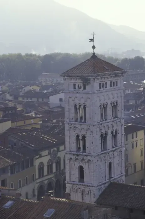 Framed Print : Italy, Tuscany, Lucca 14th C. tower and old houses with moutain in distance
