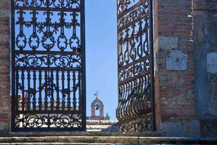 Framed Print : Italy, Tuscany, Montepulciano. The wrought iron gate leading to the cemetery near the Church of San Biaggio