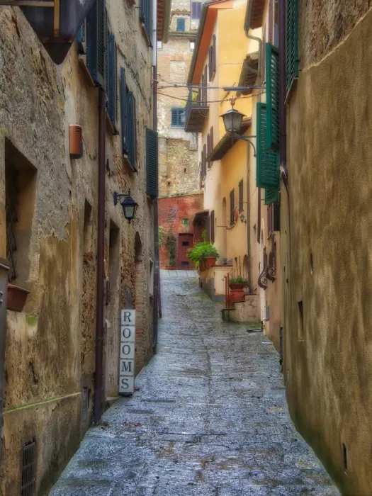 Framed Print : Italy, Tuscany. A narrow street scene in a village in Tuscany Framed Print : Italy, Tuscany. A narrow street scene in a village in Tuscany