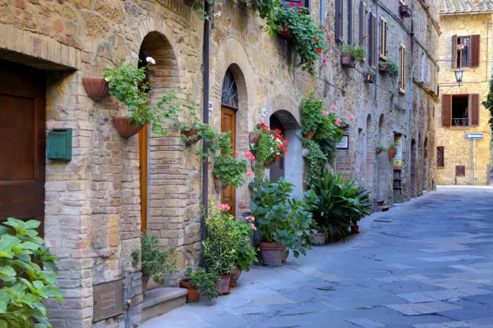 Framed Print : Italy, Tuscany, Pienza. Flower pots and potted plants decorate a narrow street in a Tuscany village Framed Print : Italy, Tuscany, Pienza. Flower pots and potted plants decorate a narrow street in a Tuscany village
